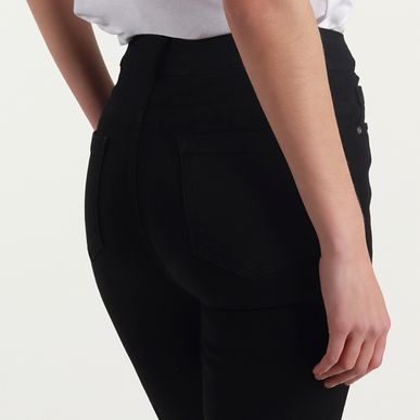 Jean ilussion tiro medio bota skinny
